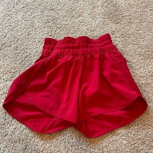 Lululemon red tracker shorts with pockets! Size 2, 4 inch! True to size!!